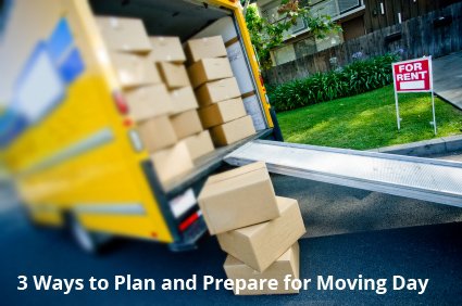 A yellow moving truck being loaded with boxes.